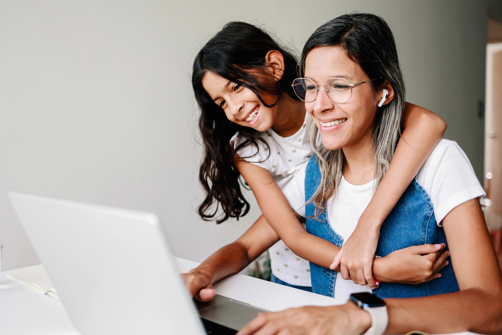 Parent and child using a computer together