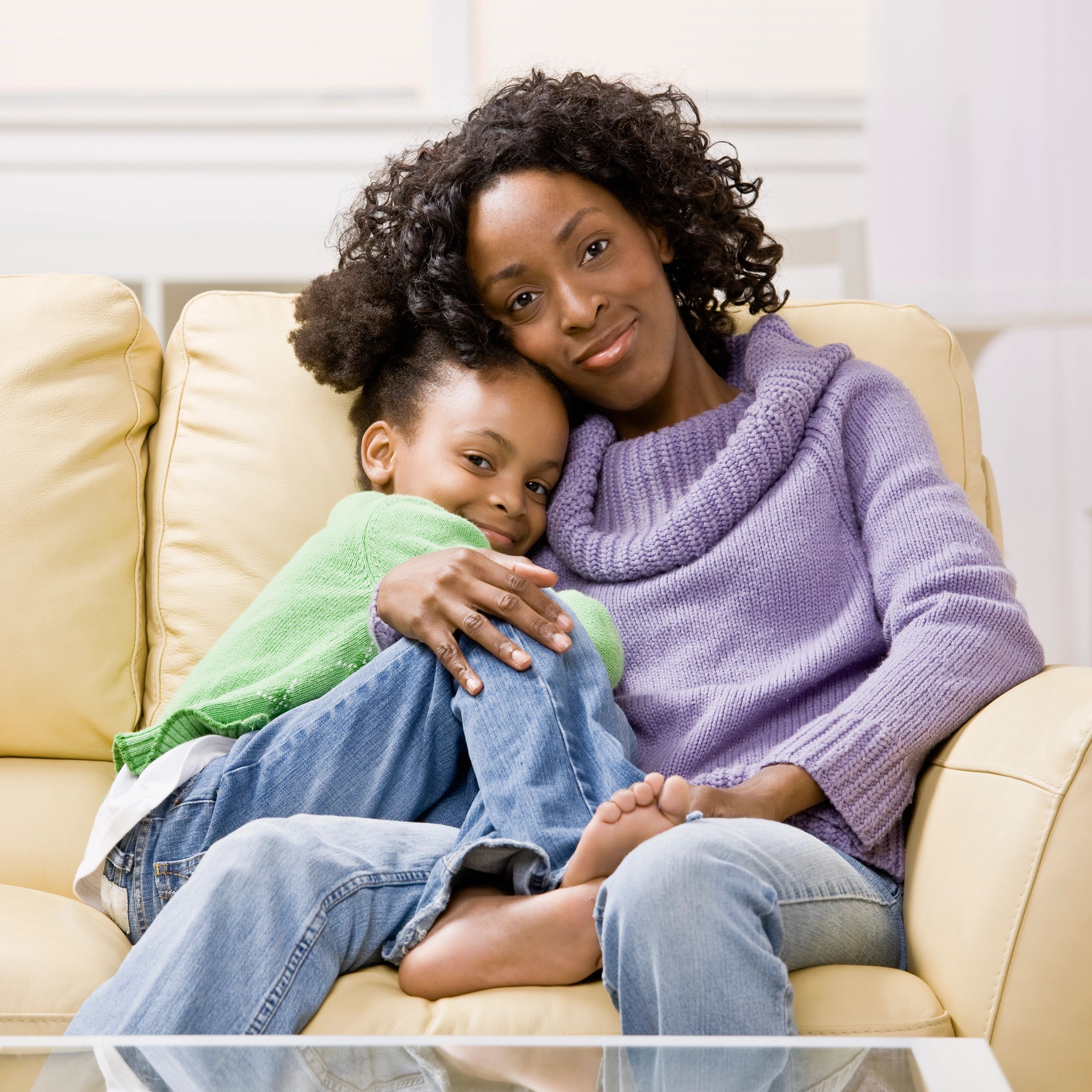 Smiling mother and daughter portrait